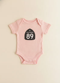 Baby CA89 Shield Onesie in Light Pink