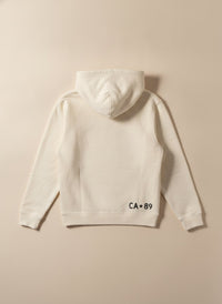 Back view of a natural kid's fleece hoodie with a lined hood